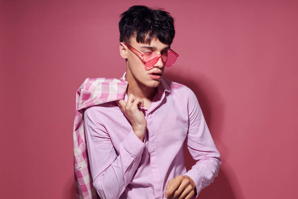Photo of romantic young boyfriend pink shirt and glasses jacket fashion elegant style Lifestyle unaltered - Fotoğraf, Görsel