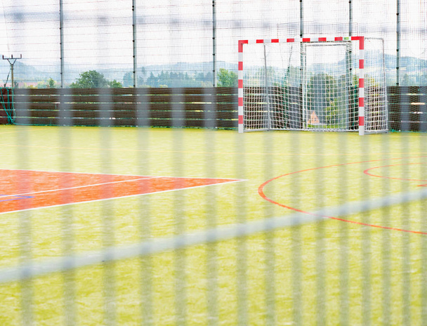 Frame and net of a soccer goal. Soccer or football goal net.  Outdoor training playfield - 写真・画像