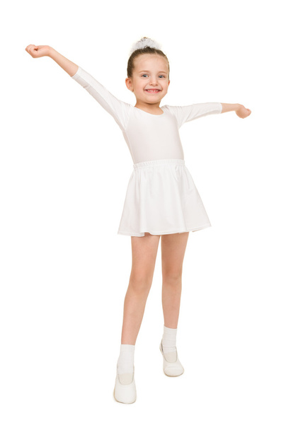 petite fille dansant dans une robe de bal blanche
 - Photo, image