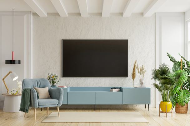 TV on the cabinet in modern living room with armchair on plaster wall background,3d rendering - Foto, afbeelding