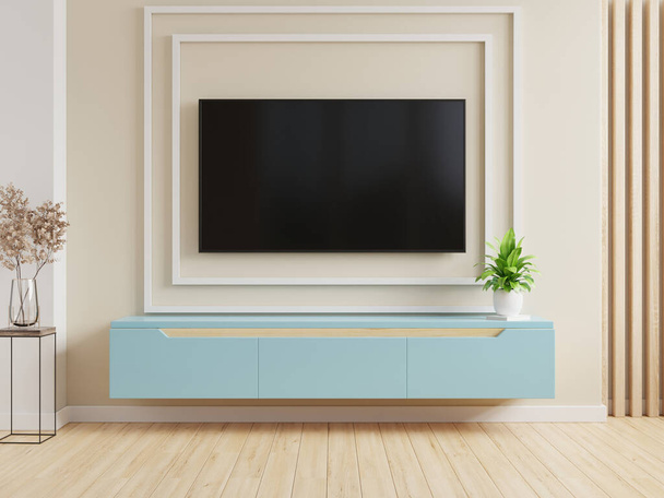 Τηλεόραση στο μπλε ντουλάπι στο σύγχρονο σαλόνι σε χρώμα κρέμα φόντο τοίχο, 3d απόδοση - Φωτογραφία, εικόνα