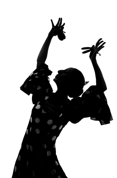 Силуэт испанской танцовщицы Фламенко, танцующей Севильянас
 - Фото, изображение