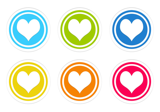Set of rounded colorful icons with heart symbol - Foto, afbeelding