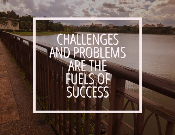 Motivational and inspirational quote with phrase CHALLENGES AND PROBLEMS ARE THE FUELS OF SUCCESS - 写真・画像