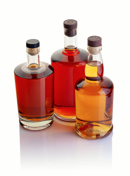 Whiskey and brandy on a white background - Photo, image