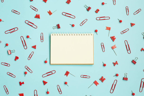 open notepad around office, school or student stationery on blue background. - Foto, Bild