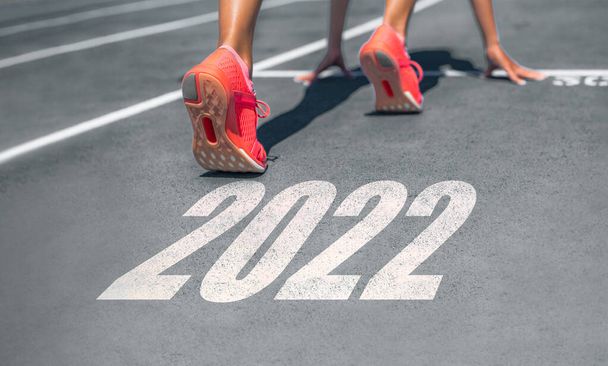 New Year 2022 ready set go fitness getting in shape woman runner at start line for goal achievement weight loss challenge banner - Photo, Image