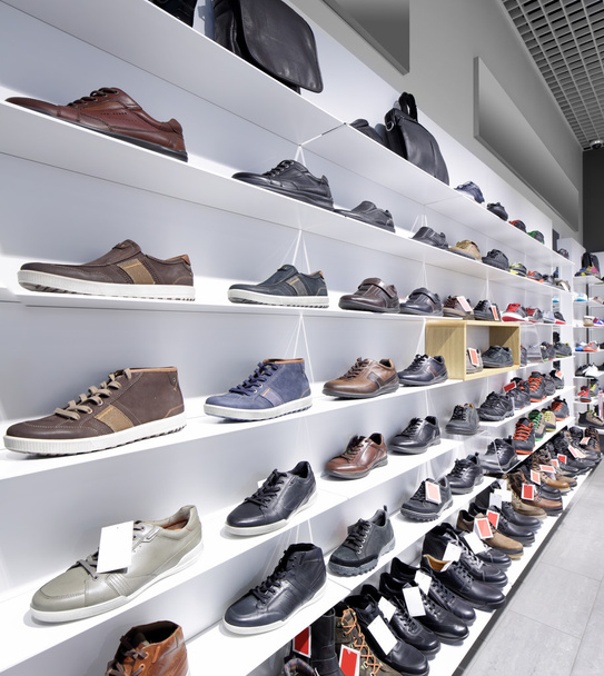 interior of shoe store in modern european mall - Фото, зображення