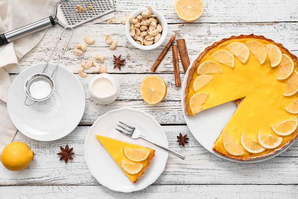 Tasty lemon tart on white wooden background - Foto, Imagem