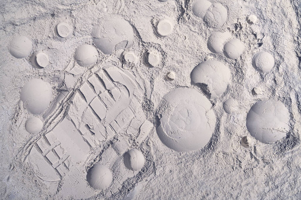 Footprints on the decorative surface of the moon. Top view - Fotó, kép