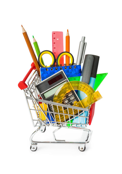 Stationery in shopping cart isolated on white background - Foto, afbeelding