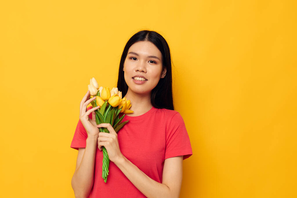 cheerful woman of asian appearance bouquet of flowers spring - Foto, Bild