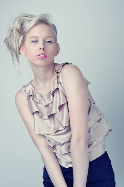 Beautiful blond fashion girl, silver top - Foto, imagen