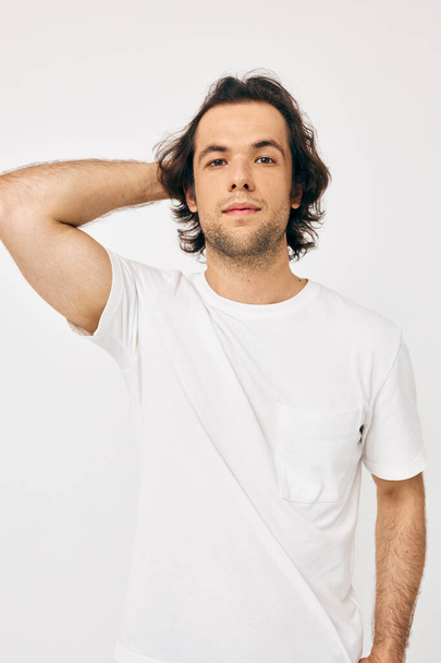 Attractive man in white t-shirt fashion cropped view Lifestyle unaltered - Foto, Imagem