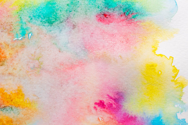 Light colorful watercolor stains. Abstract painted background on white paper - Valokuva, kuva