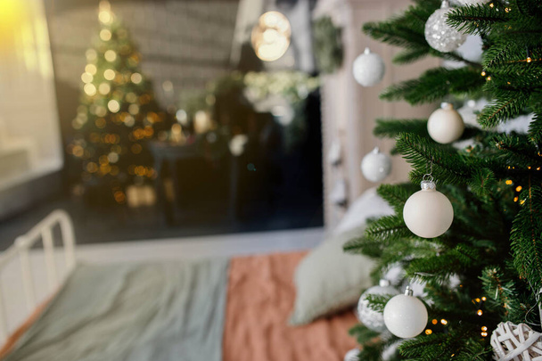 christmas tree with white balls in the apartment - Photo, Image