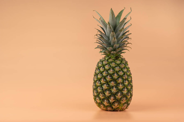 Creative copy space mockup with tropical fruit pineapple. For writing text in the concept of food on a yellow background. - Zdjęcie, obraz