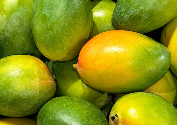 Fresh ripe mango fruit background  - Photo, Image