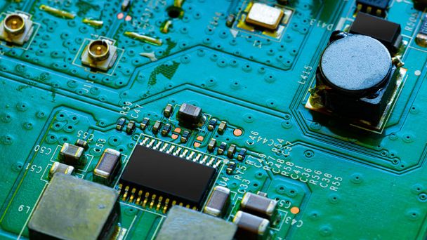 Macro Close up of components and microchips on PC circuit board	 - Foto, Bild