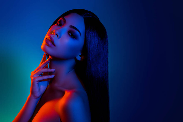 Profile side photo of feminine lady touch finger neck silky soft body isolated colorful ultraviolet background - Zdjęcie, obraz