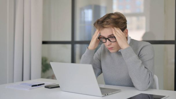 Young Man with Headache in Modern Office - Foto, Imagem