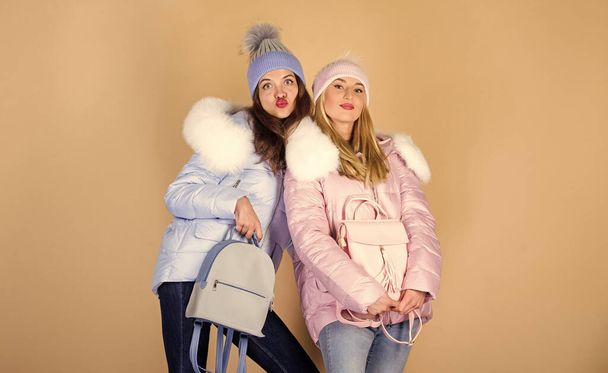 Total pastel outfit. Perfect tender combination. Best way to pair with neutral color base. Girls wear outfits in pastel colors. Little backpack and knitted hat. Pastel shades. Matching accessories - Foto, Imagen