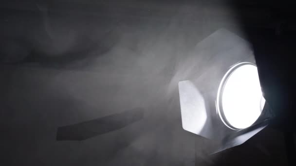 Puffs of smoke move slowly in the beams of the cinema light - Footage, Video