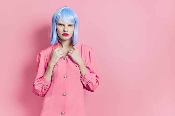 female in blue wig pink dress red lips Lifestyle posing - Photo, Image