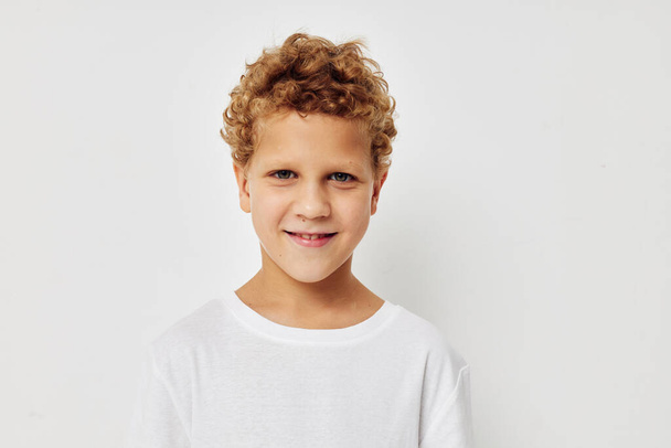Cute little boy smile in white t-shirt childhood unaltered - Photo, Image