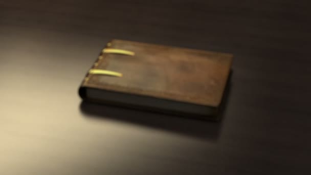 Book on wooden table - Footage, Video