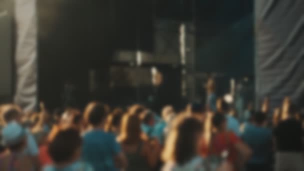 Singer performing live on the stage. Blurred image. - Felvétel, videó