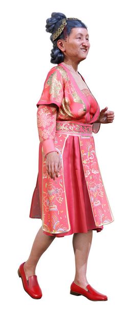 3D rendering of an Asian senior woman in a red traditional dress isolated on white background - Foto, immagini