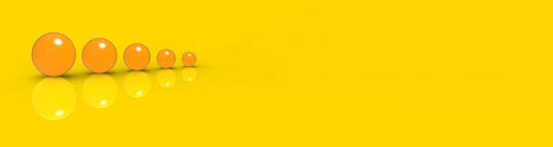 Five glass balls of different sizes of yellow color on yellow background. Growth of something. Progress. Horizontal image. Banner for insertion into site. 3D image. 3D rendering. - Photo, Image