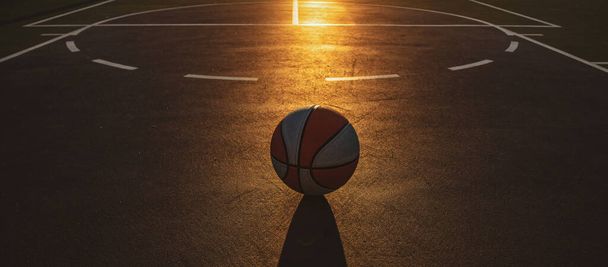 Basketball banner background. Basketball as a sports and fitness symbol of a team leisure activity playing. - Φωτογραφία, εικόνα