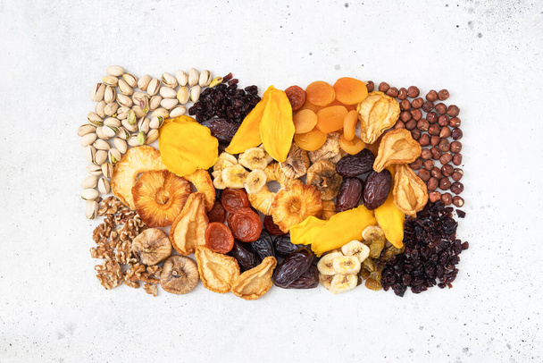 Mix of dried fruits and almonds - symbols of judaic holiday Tu Bishvat. - Foto, imagen