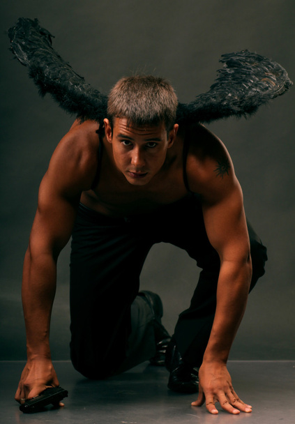 A man with angel wings. - Fotó, kép