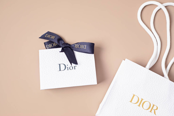 Lyon, France - January 09, 2022: Unboxing Dior bag. Luxury gift for holidays - 写真・画像