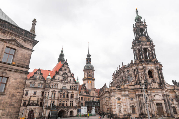 Dresden, Germany - December 19, 2021: Exterior view of the Cathedral of the Holy Trinity, Katolische Hofkirche in the old town of Dresden, Germany. - Foto, Imagem