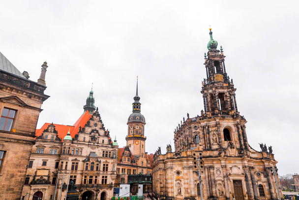 Dresden, Germany - December 19, 2021: Exterior view of the Cathedral of the Holy Trinity, Katolische Hofkirche in the old town of Dresden, Germany. - Foto, Imagen
