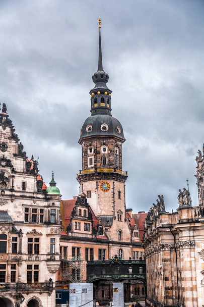Dresden, Germany - December 19, 2021: Hausmannsturm tower and Dresden Cathedral Catholic Court Church in the old town or Altstadt of Dresden, Saxony, Germany. - Foto, imagen