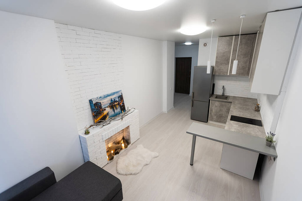 Apartamento contemporâneo com cozinha aberta e sala de estar - Foto, Imagem