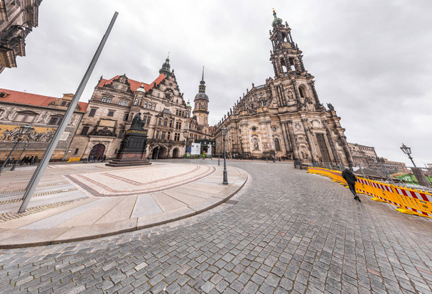 Dresden, Germany - December 19, 2021: Exterior view of the Cathedral of the Holy Trinity, Katolische Hofkirche in the old town of Dresden, Germany. - Fotó, kép