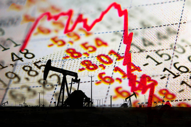 Stock market declining chart and oil rig - Photo, Image