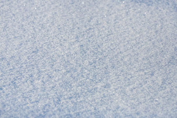 close-up of snowy surface and flakes background - Foto, Imagen