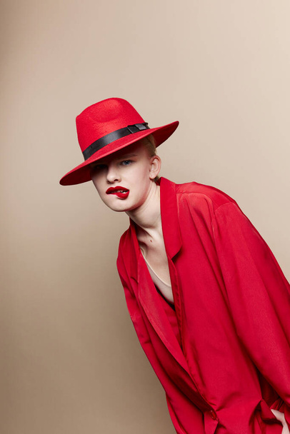 glamorous woman red lips fashion jacket cosmetics studio model unaltered - Foto, afbeelding