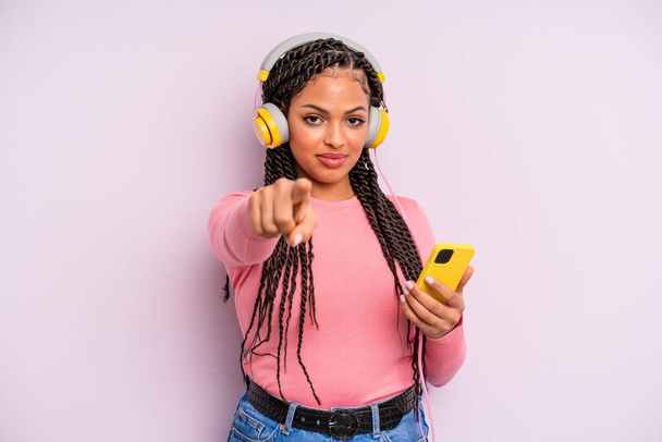 black afro woman pointing at camera choosing you. listening music concept - Φωτογραφία, εικόνα