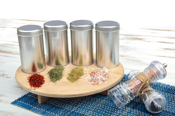 Spices on a pantry shelf. Spices in tin cans. - Foto, Imagem