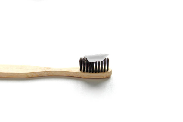 Eco-friendly bamboo toothbrushes on white background. Flat lay, top view, copy space - Zdjęcie, obraz