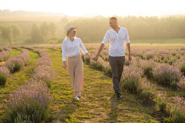 adult couple in the lavender fields - Photo, Image