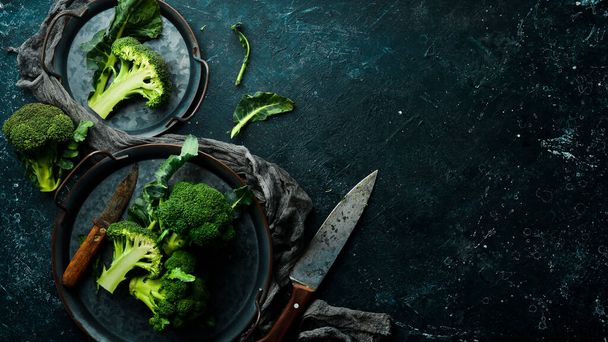 Boiled broccoli on a metal tray. Healthy vegetarian diet food. Top view. - Φωτογραφία, εικόνα